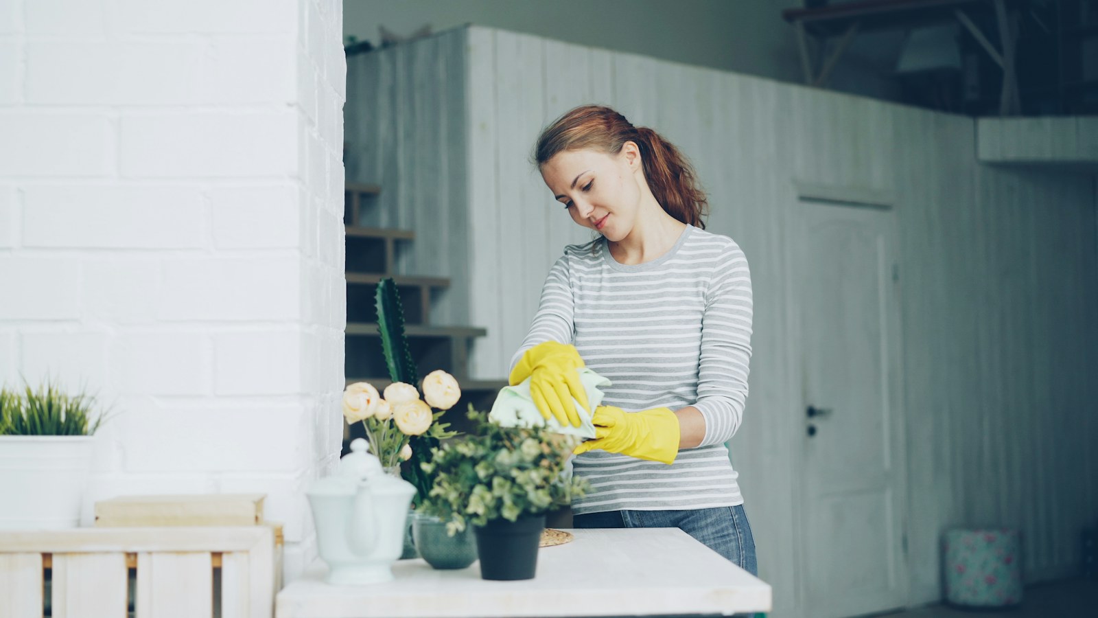 House cleaner caring for a bright home